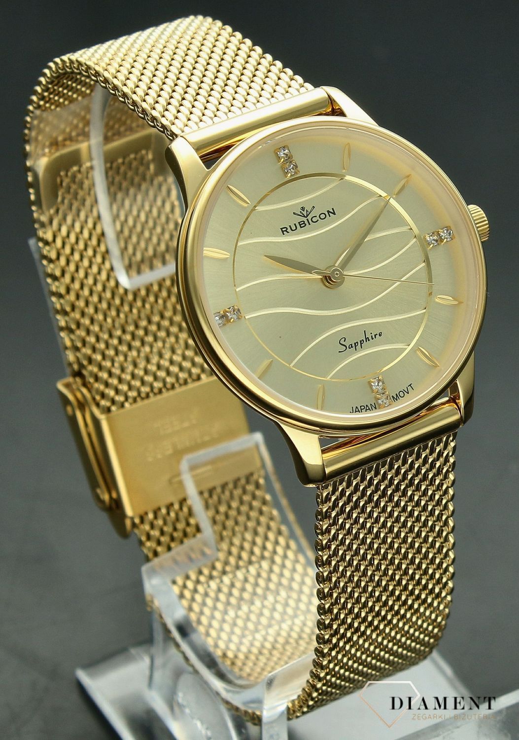 Zegarek damski Rubicon złoty z szafirowym szkłem RNBE35 z falowaną tarczą. Zegarek damski Rubicon. Zegarek damski na bransolecie Rubicon. Zegarek damski z szafirowym szkłem Rubicon. Zegarek damski na prezent..jpg